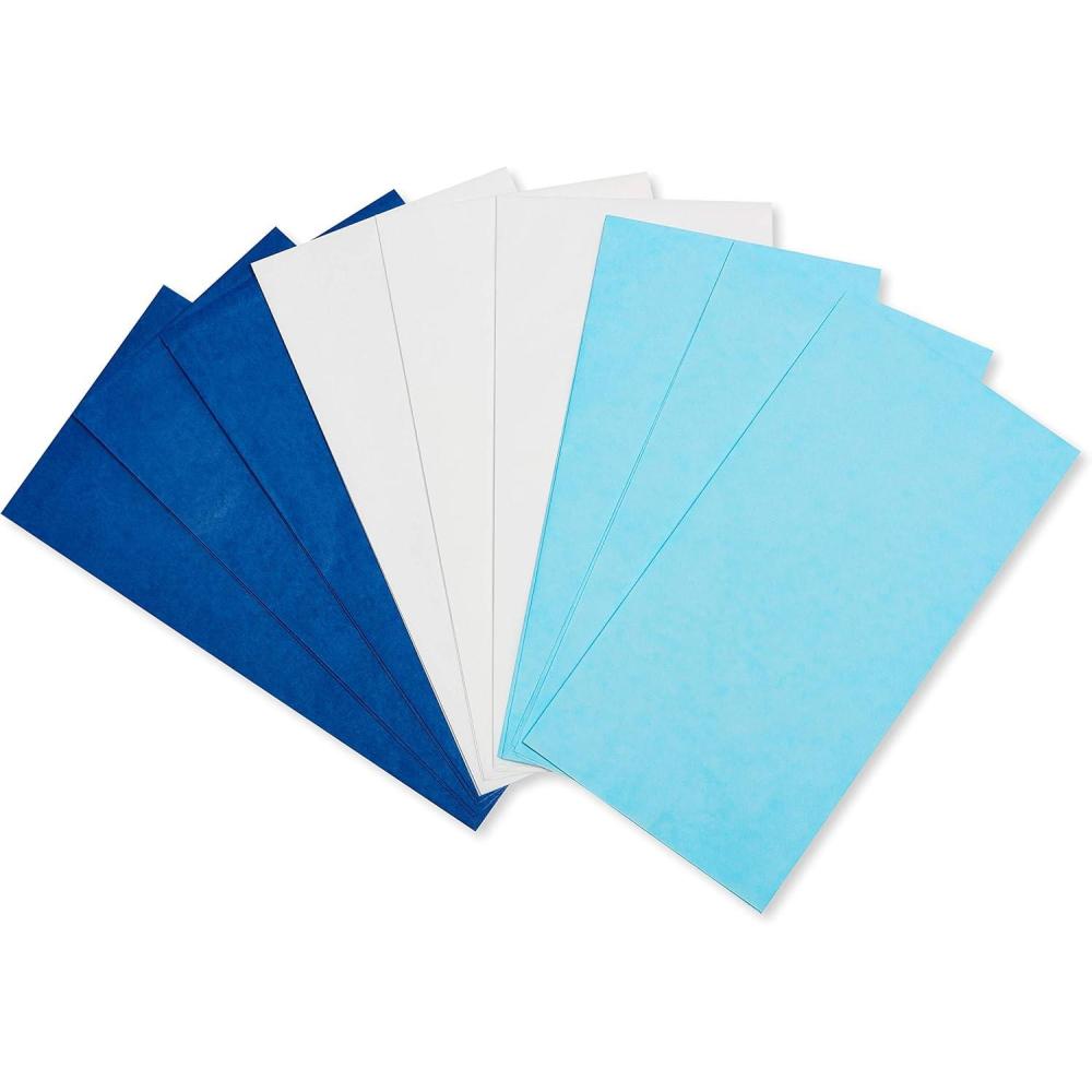 imageAmerican Greetings Reversible Hanukkah Wrapping Paper Dreidel Menorah and Star of David 4 Roll 120 Sq FtLight Blue White and Dark Blue