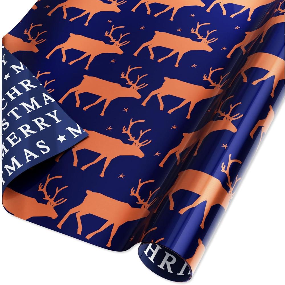 imageAmerican Greetings Foil Christmas Wrapping Paper Roll Metallic Blue and White Holiday Gift Wrap 30 sq ft 1 Reversible Roll30 in x 12 ft Polka Dots and JoyRose Gold and Navy
