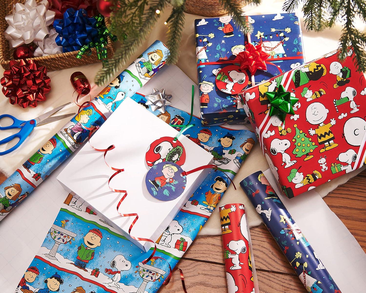 imageAmerican Greetings Peanuts Christmas Wrapping Paper Rolls Red and Blue Holiday Gift Wrap 105 sq ft 3 Rolls30 in x 14 ft Cut Lines Charlie Brown Snoopy Woodstock LucyPeanuts Characters