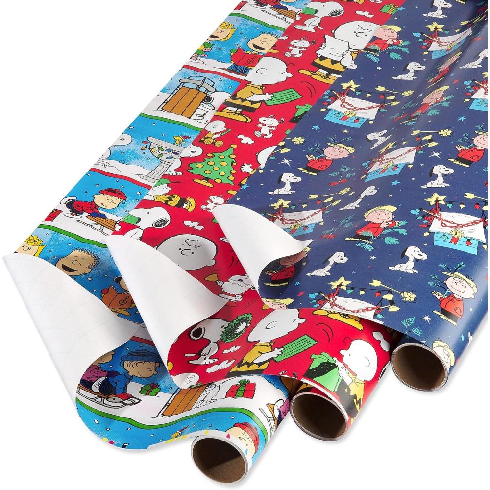 imageAmerican Greetings Peanuts Christmas Wrapping Paper Rolls Red and Blue Holiday Gift Wrap 105 sq ft 3 Rolls30 in x 14 ft Cut Lines Charlie Brown Snoopy Woodstock LucyPeanuts Characters
