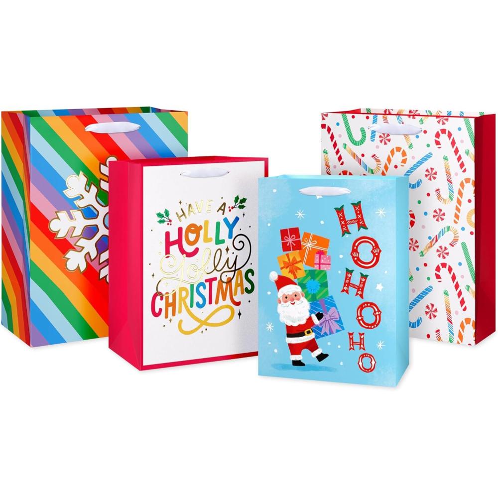 imageAmerican Greetings Reversible Rainbow Christmas Wrapping Paper Roll Colorful Holiday Gift Wrap 60 sq ft 1 Standard Roll Wrap30 in x 24 ft Rainbow Stripes Snowflakes and DotsMD LG XM RAINBOW BAG BNDL 4CT