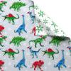 American Greetings Punny Christmas Wrapping Paper Roll, Cute Holiday Gift Wrap (60 sq. ft., 1 Reversible Roll) Smiley Christmas Trees, “Have a Tree-mendous Day”(Dinosaurs and Snowflakes)